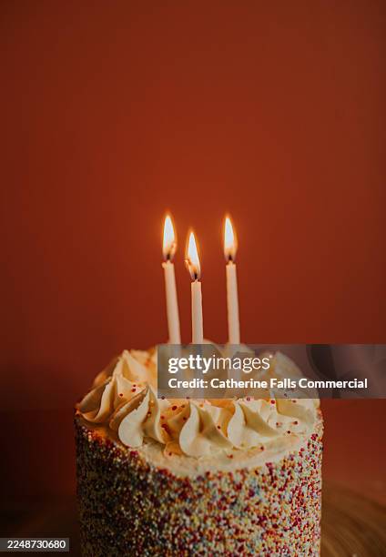 simple image of a birthday cake with 3 candles, and space for copy. - birthday gift stock pictures, royalty-free photos & images
