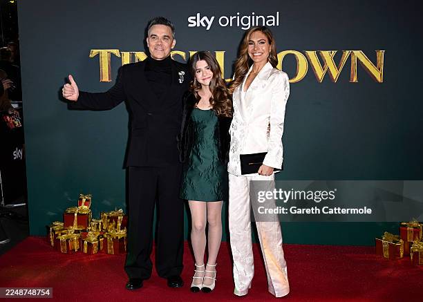 Robbie Williams, Teddy Williams and Ayda Field Williams attend the "Tinsel Town" World Premiere at Vue Leicester Square on November 27, 2025 in...