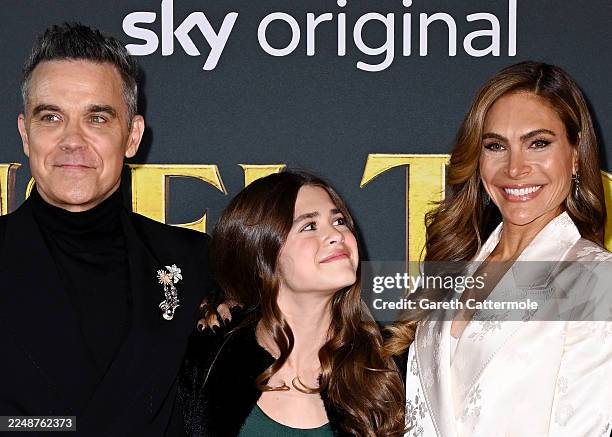 Robbie Williams, Teddy Williams and Ayda Field Williams attend the "Tinsel Town" World Premiere at Vue Leicester Square on November 27, 2025 in...