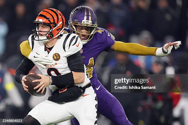 Marlon Humphrey of the Baltimore Ravens sacks Joe Burrow of the Cincinnati Bengals during the first quarter in the game at M&T Bank Stadium on...
