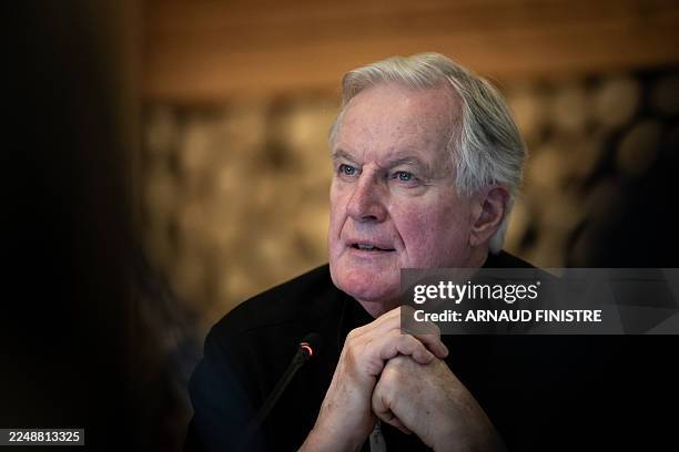 Michel Barnier, former French Prime Minister, speaks during the coordination committee meeting for the 2030 Winter Olympics in the French Alps in Val...