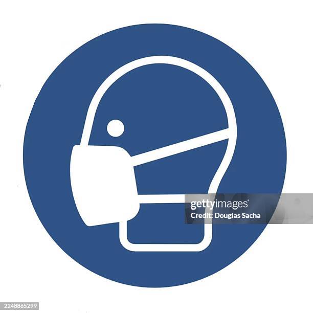sign requiring face mask for protection - bescherming tegen corona stockfoto's en -beelden