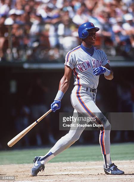 Outfielder Darryl Strawberry of the New York Mets makes contact with a pitch during the Mets versus San Francisco Giants game at Candlestick Park in...