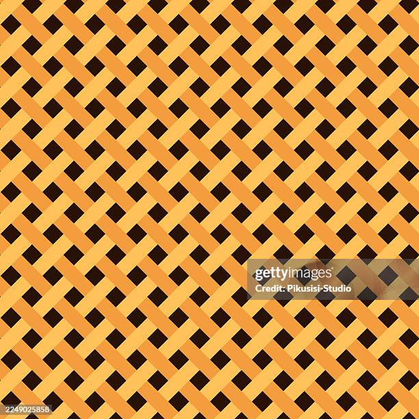 seamless orange and brown weave pattern background, interlace bamboo strips forming a rustic woven texture design - bamboo texture stock illustrations