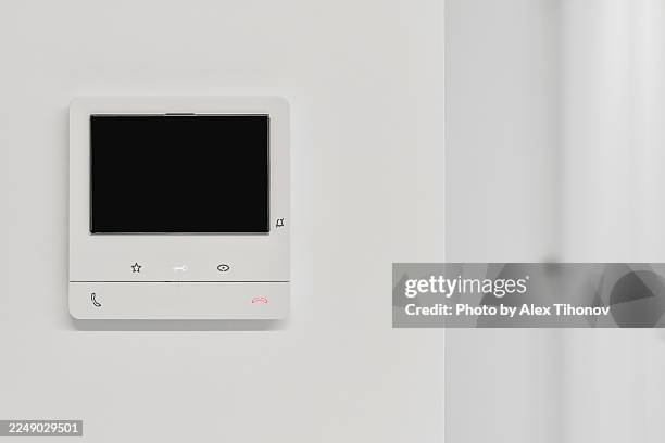 modern home intercom control panel on wall, closeup - intercom stock pictures, royalty-free photos & images