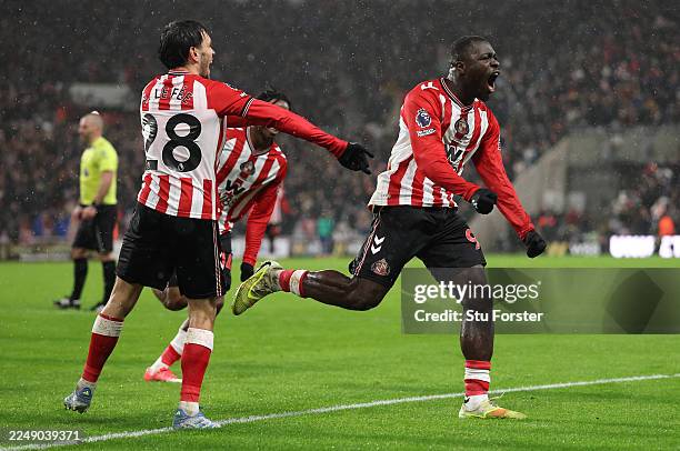 Brian Brobbey of Sunderland celebrates scoring his team's third goal during the Premier League match between Sunderland and Bournemouth at Stadium of...