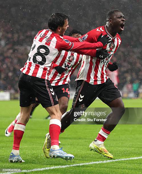 Brian Brobbey of Sunderland celebrates with team mates Enzo Le Fee after scoring the winning goal during the Premier League match between Sunderland...