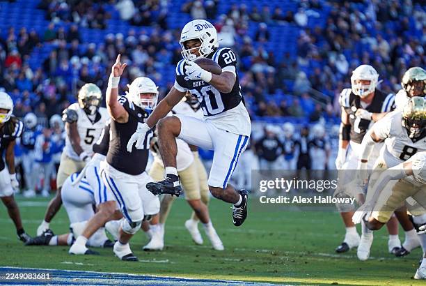 Running back Nate Sheppard of the Duke Blue Devils celebrates after scoring a touchdown during the first half of the game against the Wake Forest...
