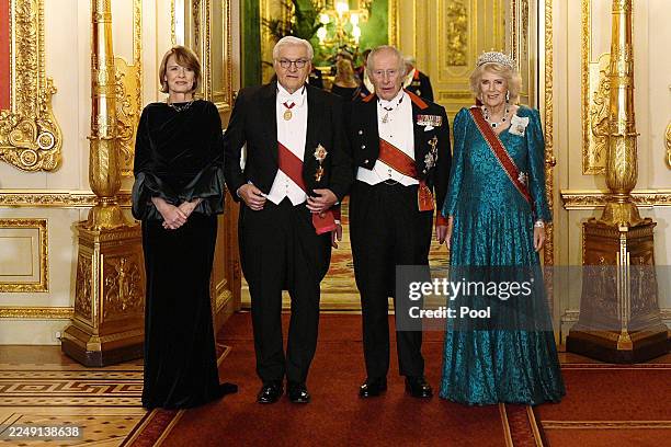 King Charles III and Queen Camilla pose with German President Frank-Walter Steinmeier and his wife Elke Budenbender ahead of the state banquet for...