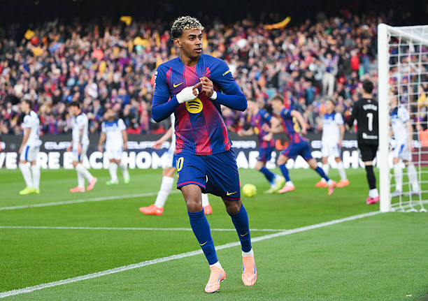 Lamine Yamal of FC Barcelona celebrates their team's first goal during the LaLiga EA Sports match between FC Barcelona and Deportivo Alaves at...