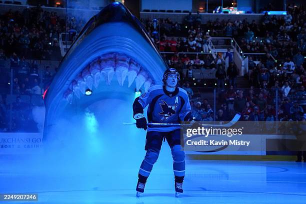 Macklin Celebrini of the San Jose Sharks takes the ice through the Shark Head before the game against the Washington Capitals at SAP Center on...