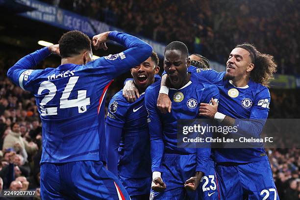 Trevoh Chalobah of Chelsea celebrates scoring his team's first goal with teammates during the Premier League match between Chelsea and Arsenal at...