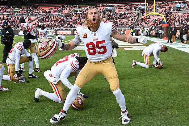 George Kittle of the San Francisco 49ers reacts before the game against the Cleveland Browns at Huntington Bank Field on November 30, 2025 in...