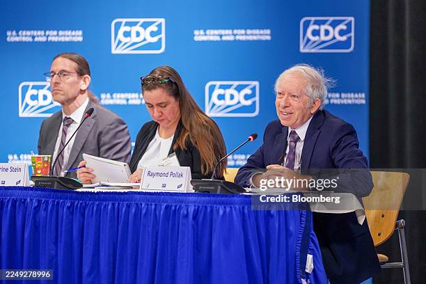 Committee members Dr. Retsef Levi, from left, Dr. Catherine Stein, and Dr. Raymond Pollak during a meeting of the CDC's Advisory Committee On...