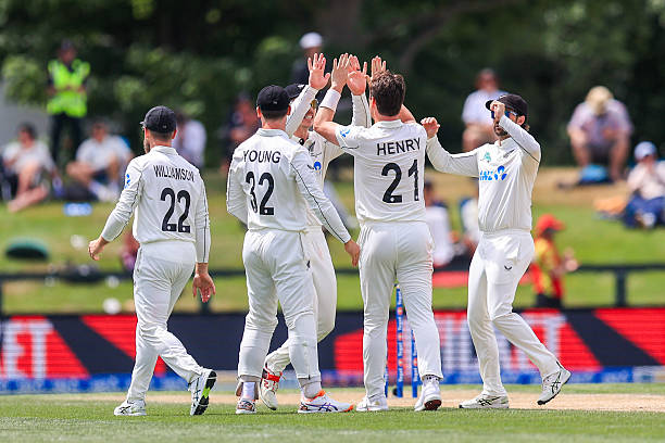 Matt Henry of New Zealand high-fives during day four of the first match in the series between New Zealand and West Indies at Hagley Oval on December...