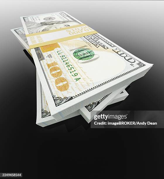 stack of thirty thousand dollars of one hundred dollar bills on black reflective surface - thousand dollar bill stock illustrations