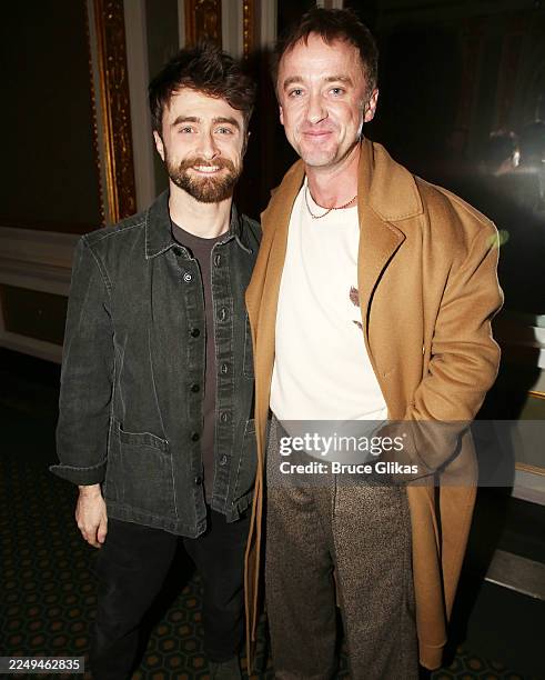 Daniel Radcliffe and Tom Felton pose during the NYC screening for the film "Merrily We Roll Along," based on the Broadway musical by Stephen...