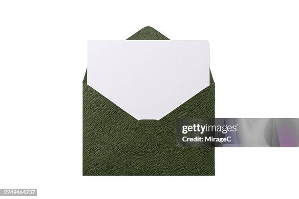 opened green envelope with blank card inside - opening envelope stock pictures, royalty-free photos & images