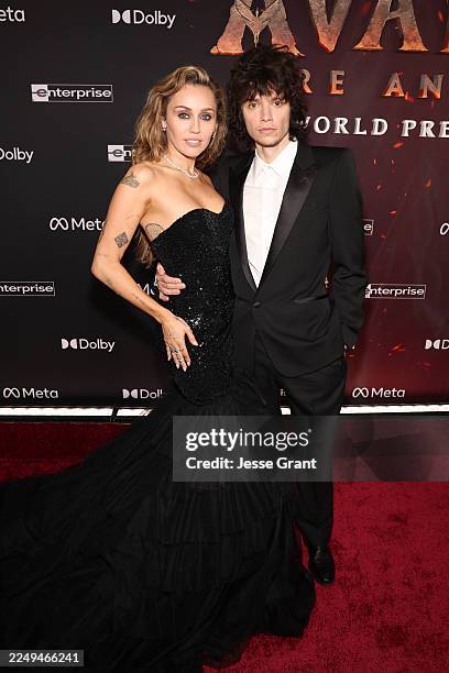 Miley Cyrus and Maxx Morando attend the world premiere of 20th Century Studios "Avatar: Fire and Ash" at The Dolby Theatre in Hollywood, California...