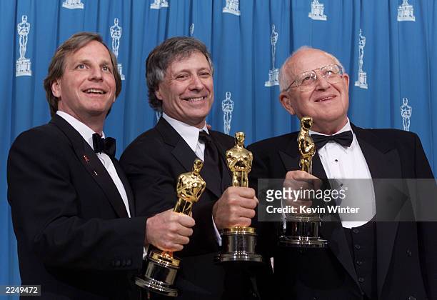 Douglas Wick, David Franzoni, and Branko Lustig, left to right, with Oscars for Best Picture of the Year for 'Gladiator,' at the 73rd Annual Academy...