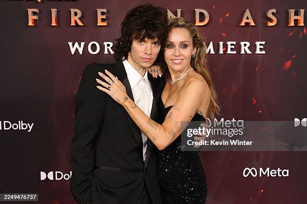 Maxx Morando and Miley Cyrus attend the Global Premiere of 20th Century Studios' "Avatar: Fire And Ash" at Dolby Theatre on December 01, 2025 in...