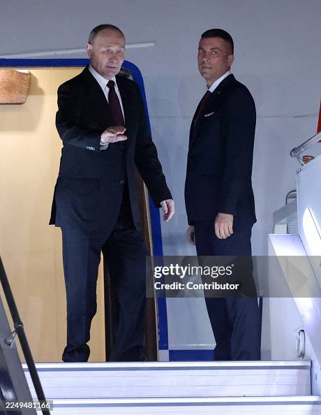 Putin Wave Russian President Vladimir Putin waves during his departure from the ...