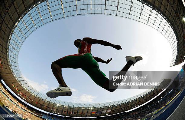 Portugal's Nelson Evora competes during the men's triple jump final of the 2009 IAAF Athletics World Championships on August 18, 2009 in Berlin. AFP...