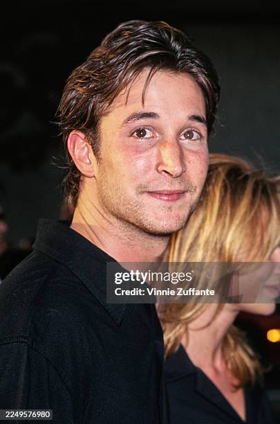 American actor Noah Wyle attends the Premiere of Barry Sonnenfeld's 'Men in Black' at the Cinerama Dome, Hollywood, 25th June 1997.