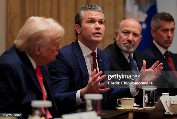 Secretary of War Pete Hegseth speaks during a Cabinet meeting alongside U.S. President Donald Trump, U.S. Secretary of Commerce Howard Lutnick and...