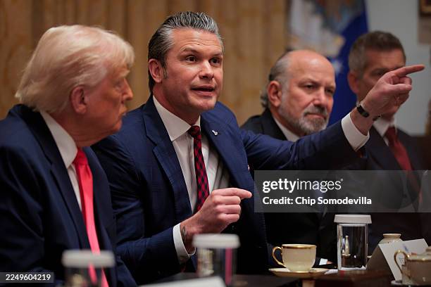 Secretary of War Pete Hegseth speaks during a Cabinet meeting alongside U.S. President Donald Trump, U.S. Secretary of Commerce Howard Lutnick and...