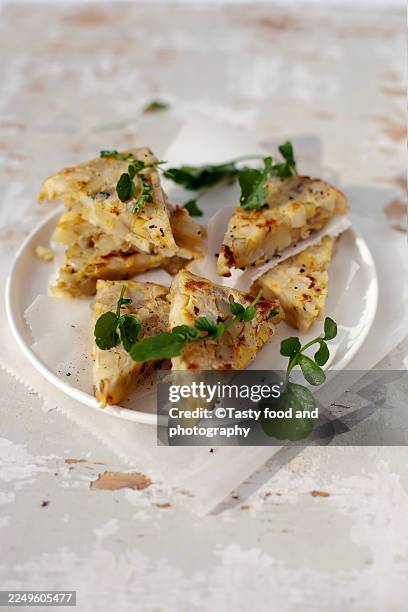 tortilla with potatoes - tortilla de patata fotografías e imágenes de stock