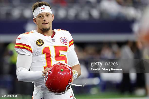 Patrick Mahomes of the Kansas City Chiefs participates in warmups prior to a game against the Dallas Cowboys at AT&T Stadium on November 27, 2025 in...