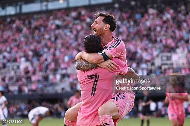Inter Miami forward Lionel Messi jumps into th arms of Inter Miami midfielder Rodrigo de Paul after a goal i the second half during the 2025 MLS Cup...