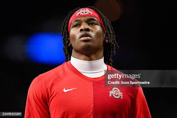 Ohio State Buckeyes wide receiver Jeremiah Smith warms up on the field before the Big 10 Championship game between the Ohio State Buckeyes and...