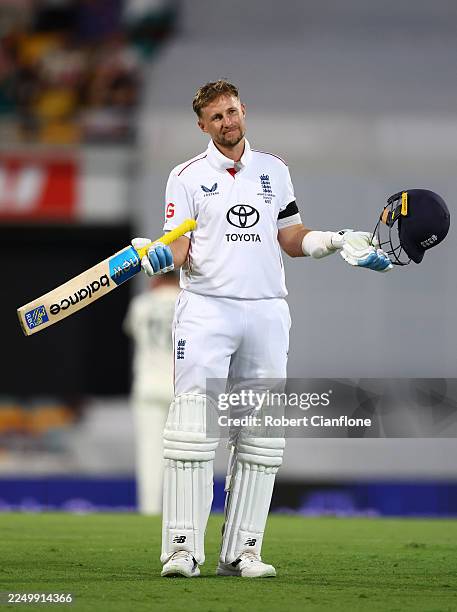 Joe Root of England celebrates after scoring a century during day one of the Second 2025/26 Ashes Series Test Match between Australia and England at...