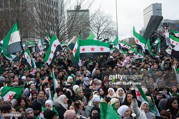 Thousands of Syrians gather on the streets of Essen, Germany, on December 7 and celebrate the anniversary of the fall of the Assad regime.