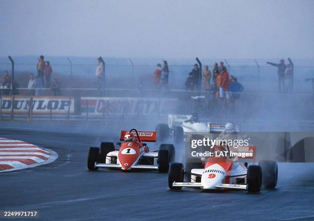 Emanuele Pirro from Italy drives the Marlboro Onyx Racing March 85B Cosworth DFV V8 ahead of Mike Thackwell from New Zealand drives the Ralt Racing...