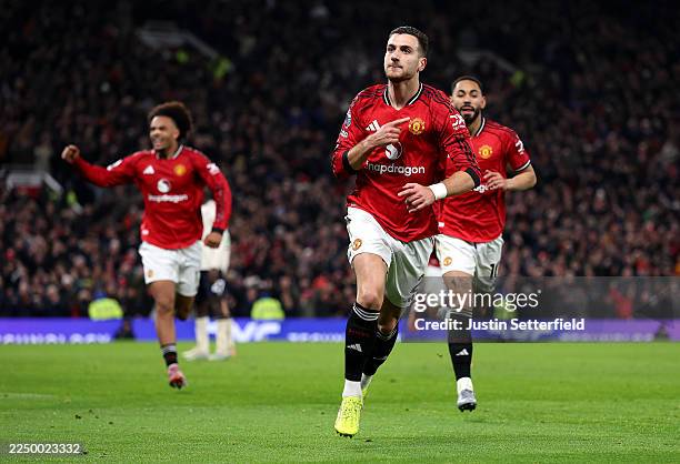 Diogo Dalot of Manchester United celebrates scoring his team's first goal during the Premier League match between Manchester United and West Ham...