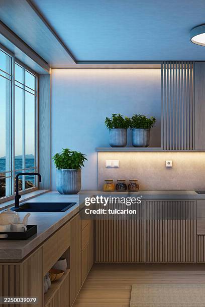 japandi kitchen interior on two walls l shape with pine wood and minimalist styling at dusk night - new features stock pictures, royalty-free photos & images
