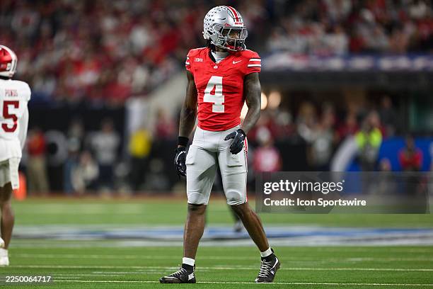 Ohio State Buckeyes wide receiver Jeremiah Smith looks to the sidelines during the Big 10 Championship game between the Ohio State Buckeyes and...