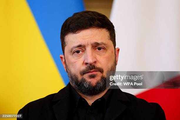 Ukrainian President Volodymyr Zelenskyy looks on during a meeting with British Prime Minister Keir Starmer, German Chancellor Friedrich Merz and...