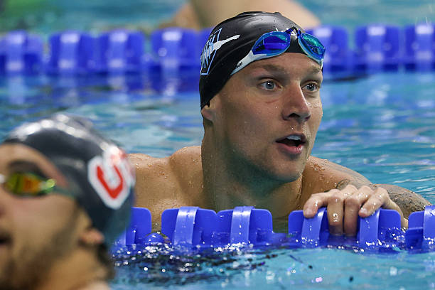 Caeleb Dressel in the pool after a men's 100 meter butterfly preliminary heat during day three of the Toyota US Open Championships at Lee & Joe...