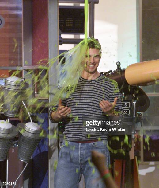 Tom Cruise gets slimed at Nickelodeon's 14th Annual Kids' Choice Awards at Barker Hanger in Los Angeles Saturday, April 21, 2001. Photo by Kevin...