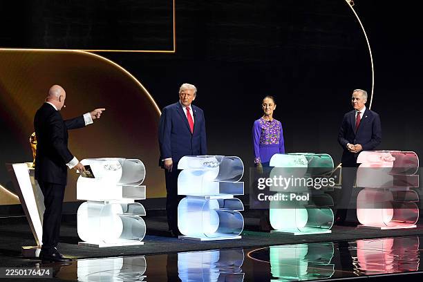President Donald Trump, Claudia Sheinbaum, President of Mexico, and Mark Carney, Prime Minister of Canada, prepare to draw on stage during the FIFA...