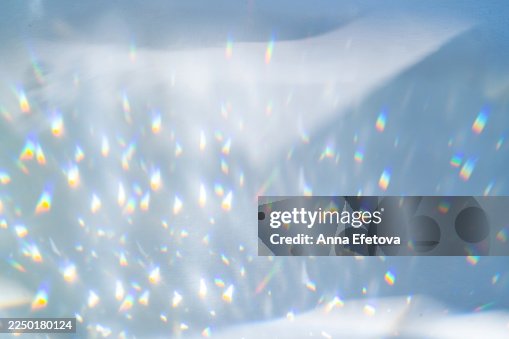 Reflecting rainbow light specks creating abstract background pattern. Color of 2026 year - dancer in the white cloud Reflecting rainbow light specks creating abstract background pattern. Color of 2026 year - dancer in the white cloud