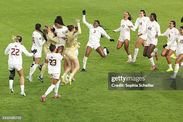 The Florida State Seminoles celebrate defeating the Stanford Cardinal during the Division I Women's Soccer Championship held at CPKC Stadium on...