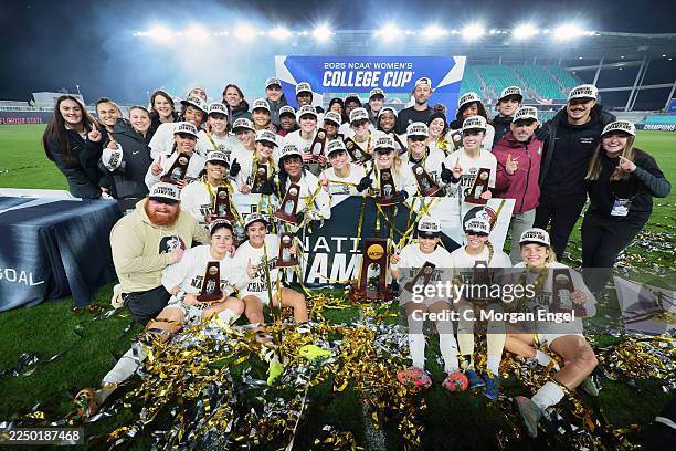 The Florida State Seminoles pose for a photo after beating the Stanford Cardinal during the Division I Women's Soccer Championship held at CPKC...