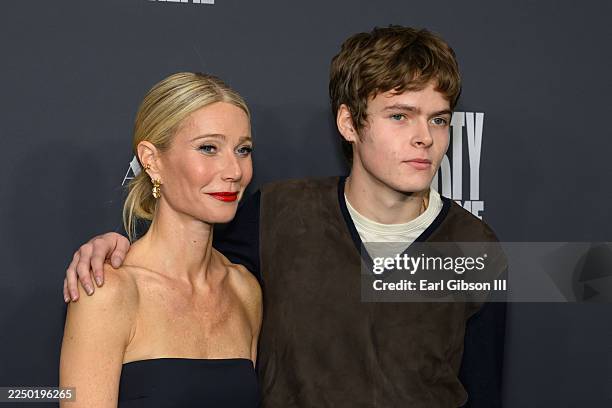 Gwyneth Paltrow and Moses Martin at the "Marty Supreme" Los Angeles Premiere held at the Samuel Goldwyn Theatre on December 08, 2025 in Los Angeles,...