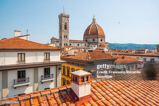 florence italy rooftops with duomo and giottos campanile visible - renaissance stock pictures, royalty-free photos & images
