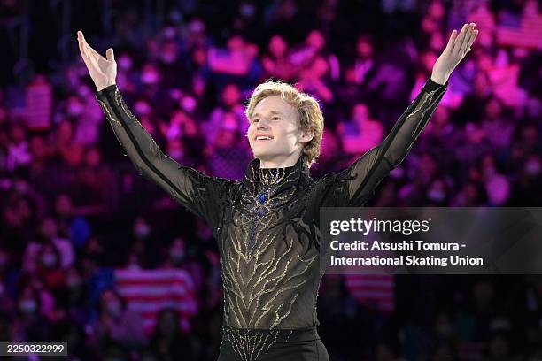Gold medalist Ilya Malinin of the United States acknowledges fans before the victory ceremony for the Men during the ISU Grand Prix of Figure Skating...